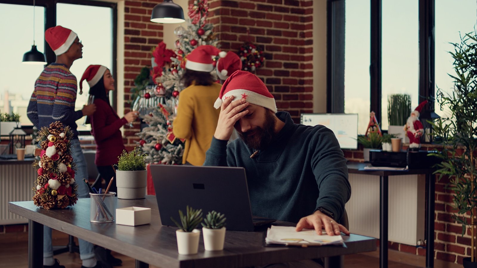 Employee being frustrated by christmas holiday festivity